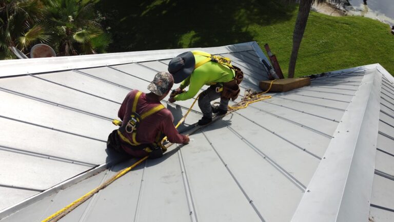 Jacksonville Residential Roofers working installing metal roof